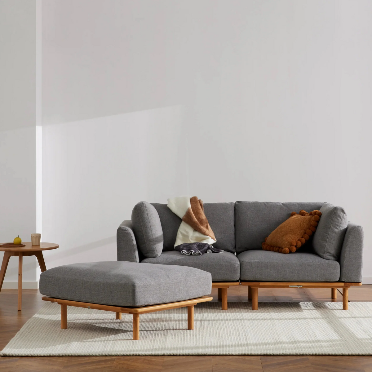 Anika Modular Sofa, steel grey, styled in a living room
