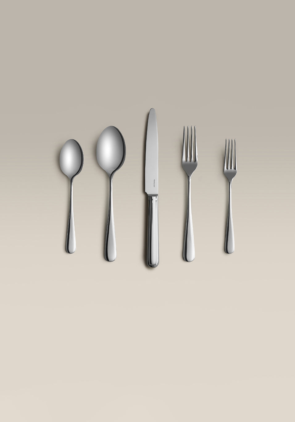 Classic Four-Person Settings Flatware Set, styled on a table