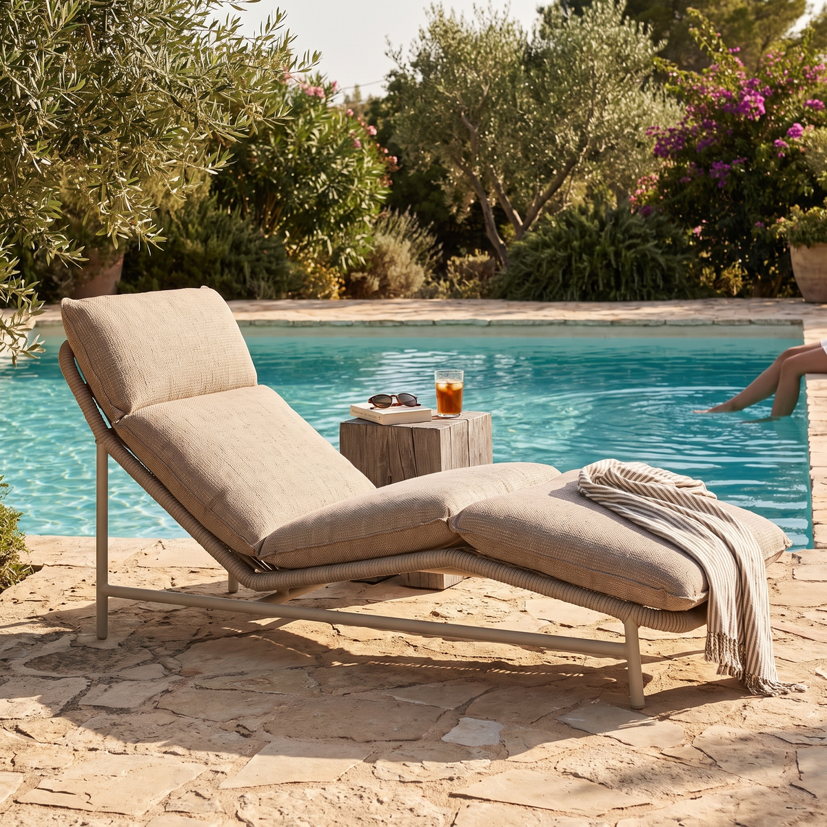 Silverado Dune Aluminum Sun Lounger, styled in a real setting