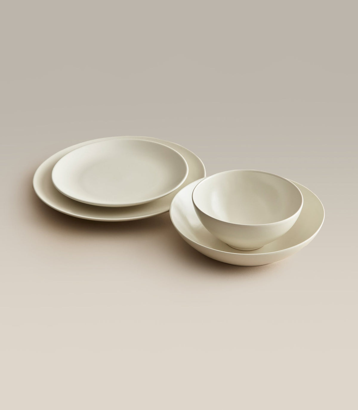 Big Stoneware Plate Set, second held in hand for scale