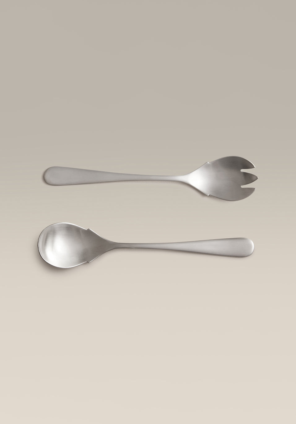 Classic Fork & Spoon Stainless Steel Serving Set, close up of the edge
