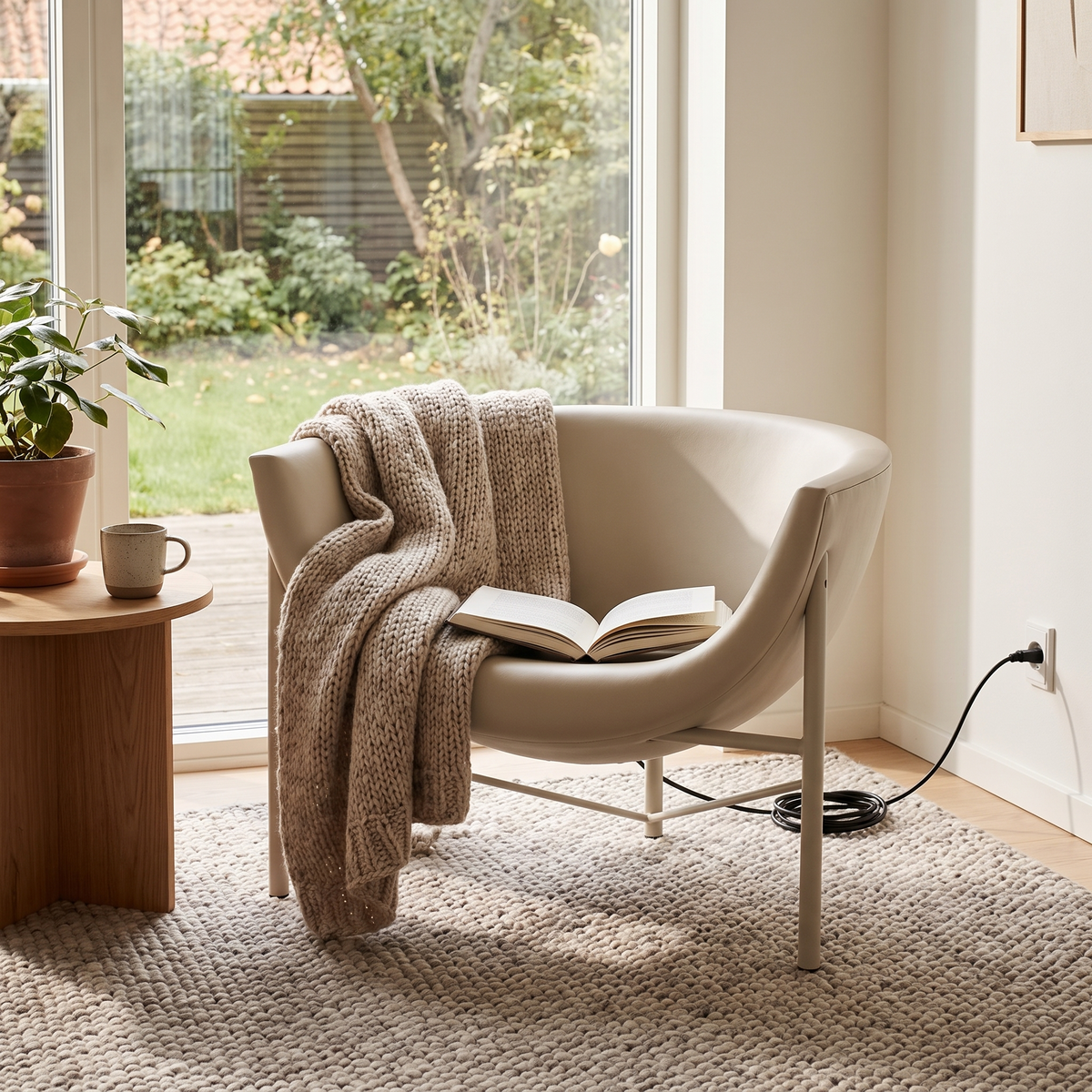 Kosmos Heated Dune Lounge Chair, styled in a real setting
